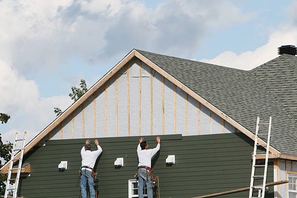 Professional Emergency Siding Repair technician working in Troy, OH